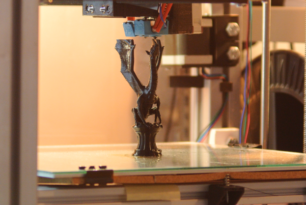 3D printer Printing a dragon model